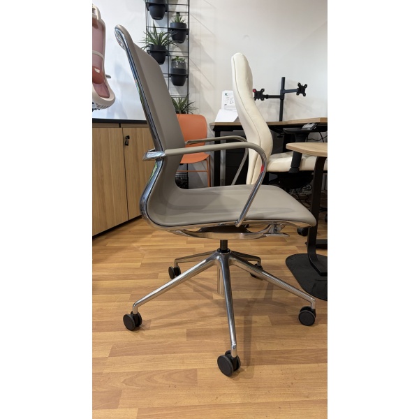 Right Side view of the Baye Leather Chair with padded leather seat, chrome frame, and rolling aluminium base.
